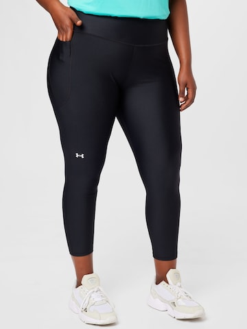 UNDER ARMOUR Skinny Sports trousers in Black: front