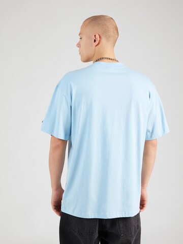 ELLESSE Koszulka 'Deliora' w kolorze niebieski