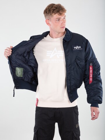 ALPHA INDUSTRIES Regular fit Between-Season Jacket 'CWU 45' in Blue
