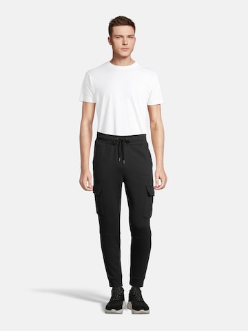 AÉROPOSTALE Tapered Cargo trousers 'HYBRID' in Black