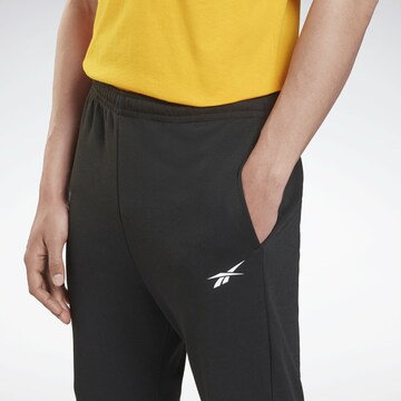 Regular Pantalon de sport Reebok en noir