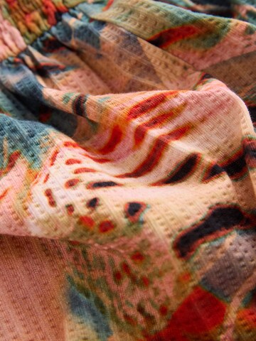 Combinaison Next en vert