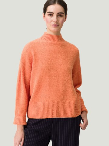 Pullover di zero in arancione: frontale