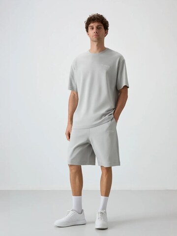 Tommy Life - Fato de desporto em cinzento: frente