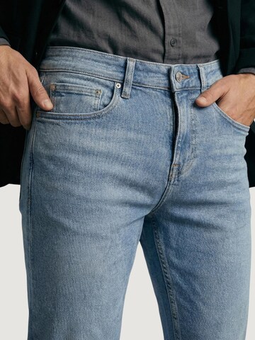 Slimfit Jeans 'FINNLEY' di GUESS in blu