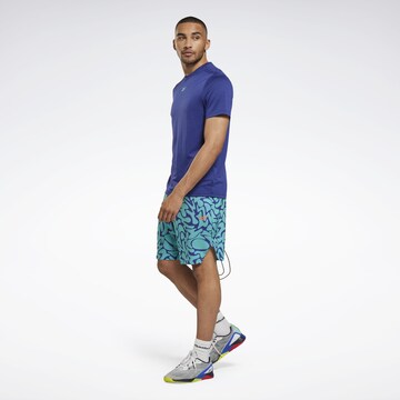 Reebok Regular Sports trousers in Blue