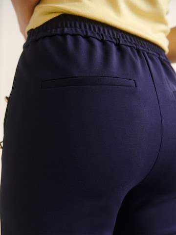 Guido Maria Kretschmer Women Slimfit Spodnie 'Caya' w kolorze niebieski