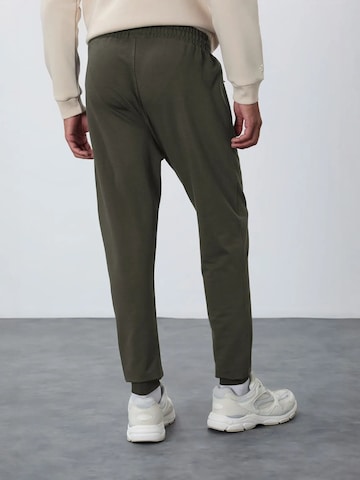 Regular Pantalon de sport Tommy Life en vert