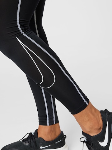 NIKE Skinny Sporthose in Schwarz