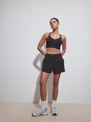 Loosefit Pantaloni sportivi di Next in nero