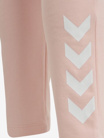 Hummel Slim fit Workout Pants 'NONI 2.0' in Pink