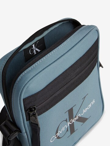 Calvin Klein Jeans Crossbody Bag in Blue