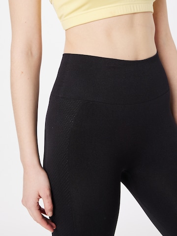 Athlecia Skinny Workout Pants 'Okalia' in Black