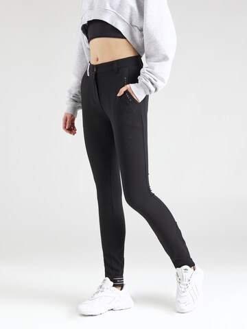 ELLESSE - Slimfit Pantalón deportivo 'Torie' en negro: frente