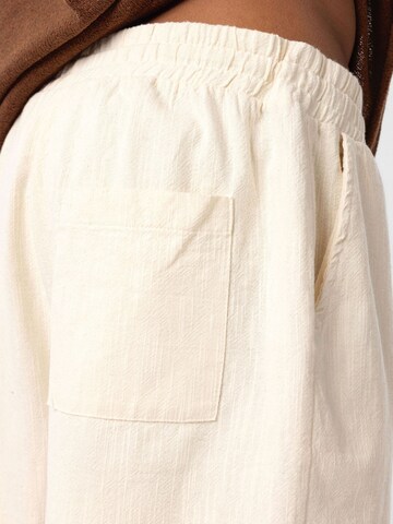 Dandalo Loose fit Trousers in Beige