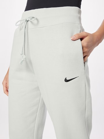 Nike Sportswear Zwężany krój Spodnie w kolorze szary