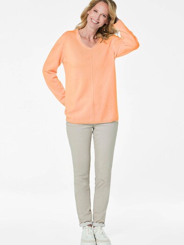 Goldner Trui in Oranje