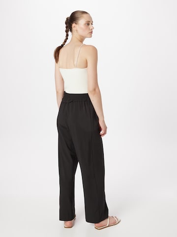 TOPSHOP Regular Trousers with creases in Black