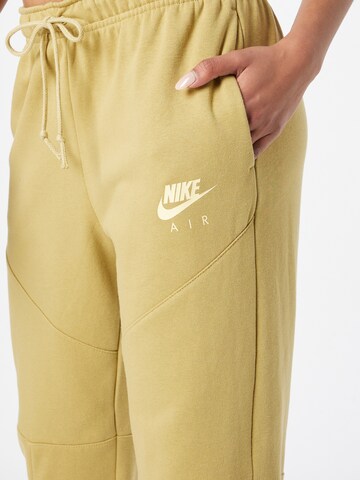 Nike Sportswear Zwężany krój Spodnie w kolorze beżowy