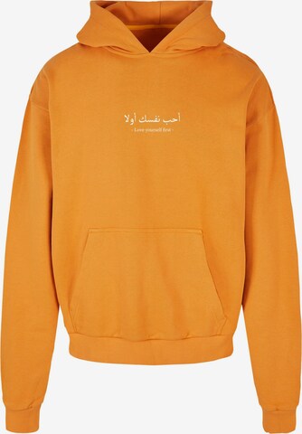 Merchcode Sweatshirt 'Love Yourself First' in Orange: front
