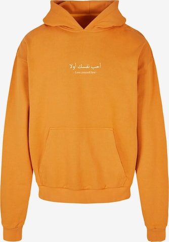 Merchcode Sweatshirt 'Love Yourself First' in Oranje: voorkant