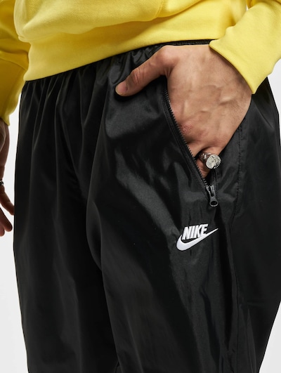 NIKE Pantalon de sport en S en noir, Vue avec produit