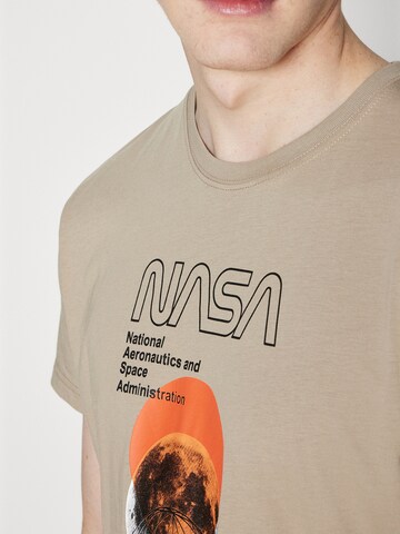 ALPHA INDUSTRIES Μπλουζάκι 'NASA Orbit' σε μπεζ