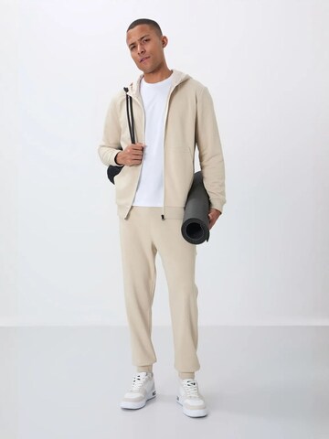 Tommy Life Sweat suit in Beige: front