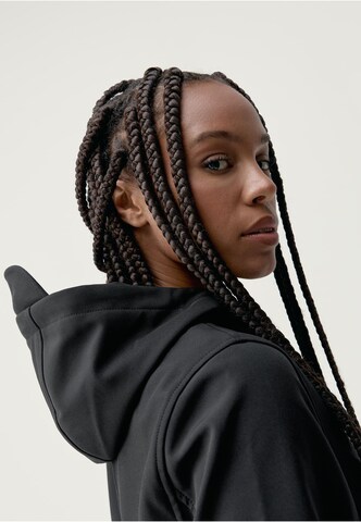 Veste mi-saison 'Trench' Born Living Yoga en noir