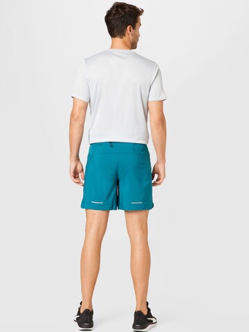 ASICS Normální Sportovní kalhoty 'ROAD' – modrá