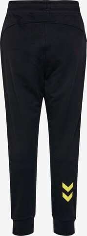 Effilé Pantalon Hummel en noir