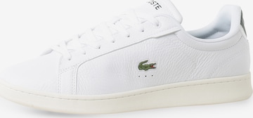 Baskets basses LACOSTE en blanc : devant