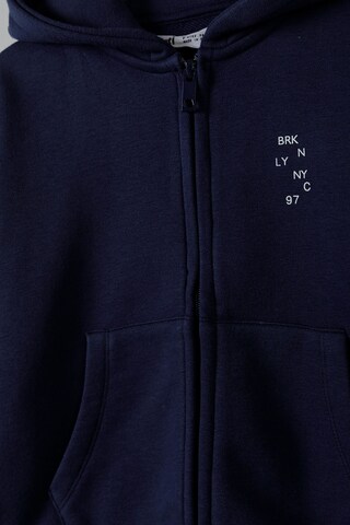 Veste de survêtement MINOTI en bleu