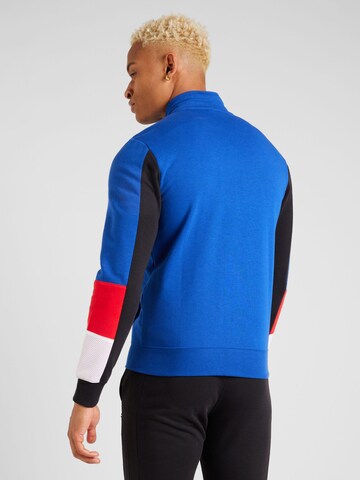 Champion Authentic Athletic Apparel Tracksuit in Blue