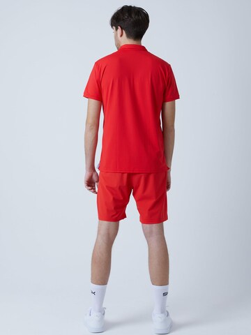 T-Shirt fonctionnel 'Polo' SPORTKIND en rouge