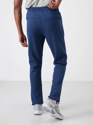 Tommy Life Szabványos Sportnadrágok 'Jogginghose' - kék
