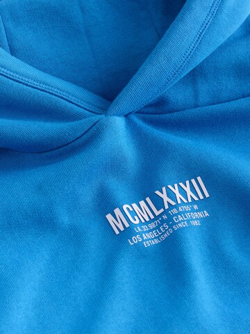 Next - Sudadera en azul