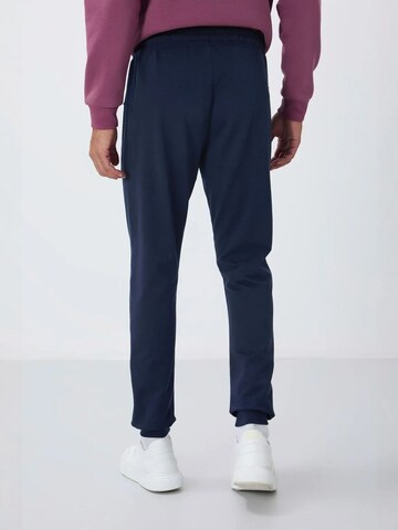 Tommy Life Tapered Workout Pants 'Jogginghose' in Blue