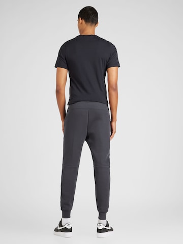 Tapered Pantaloni 'TECH FLEECE' de la Nike Sportswear pe gri