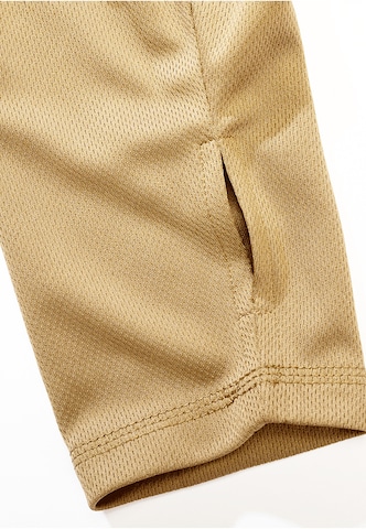 Maglietta di Brandit in beige