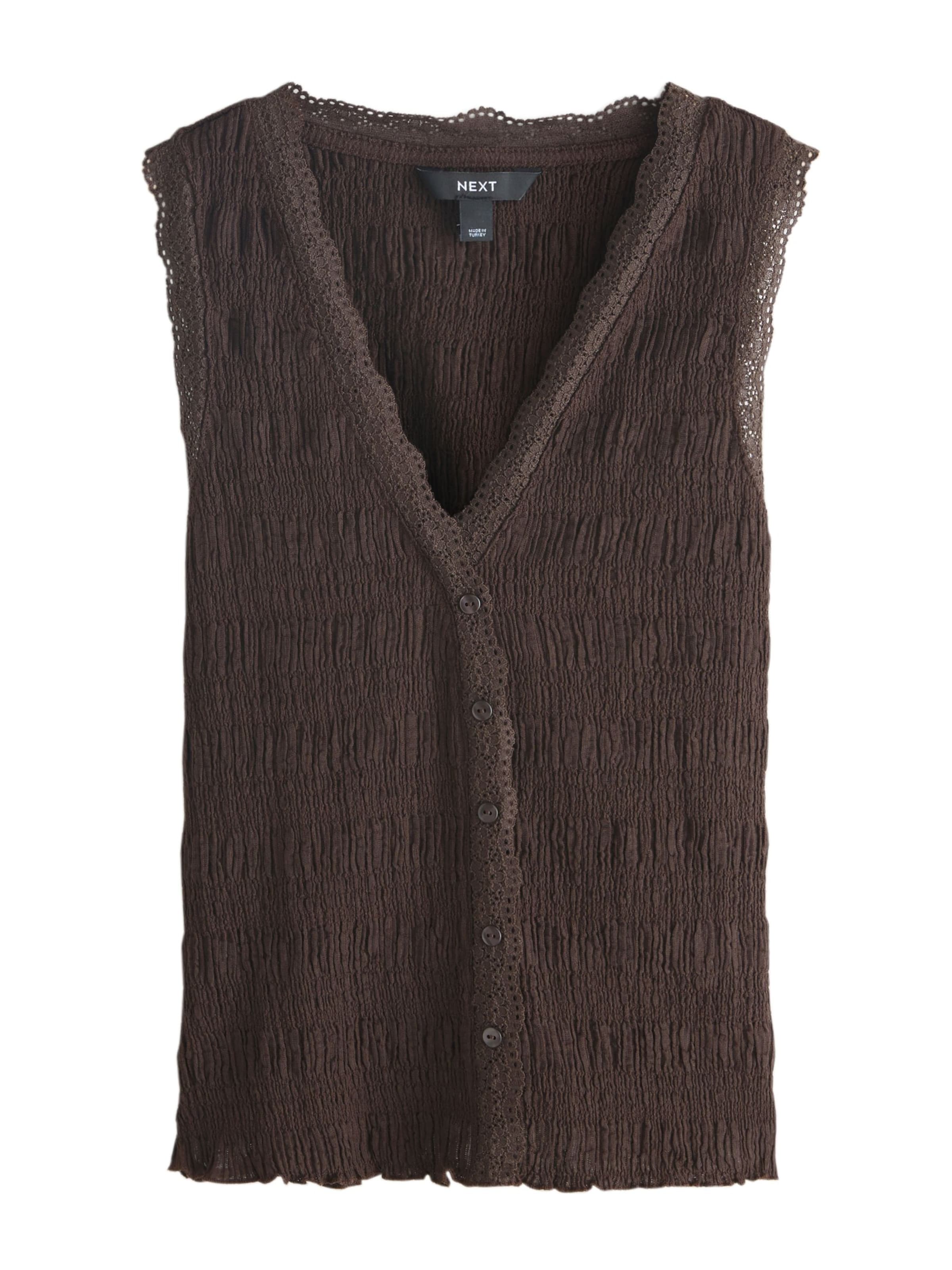 Next Vest i brun: forside