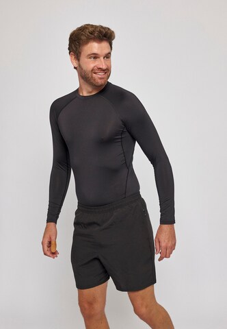 Maglia funzionale di SNOCKS in nero