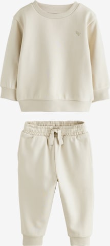 Next Juoksupuku värissä beige: etupuoli