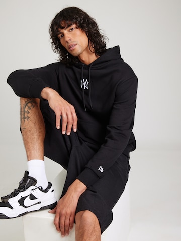 Sweat-shirt 'NEYYAN' NEW ERA en noir : devant