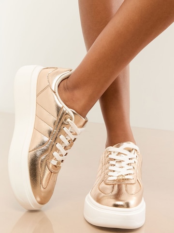 Lipsy Sneaker in Gold