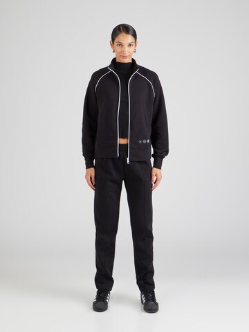 Champion Authentic Athletic Apparel - Chándal 'C-Tech' en negro