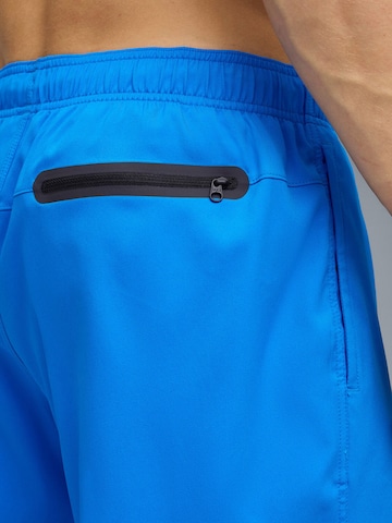 regular Pantaloni sportivi 'Puma Swim Men Medium Length Swim Shorts' di PUMA in blu