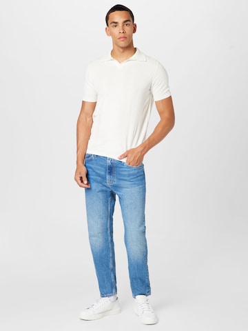 Calvin Klein Jeans Tapered Jeans in Blauw