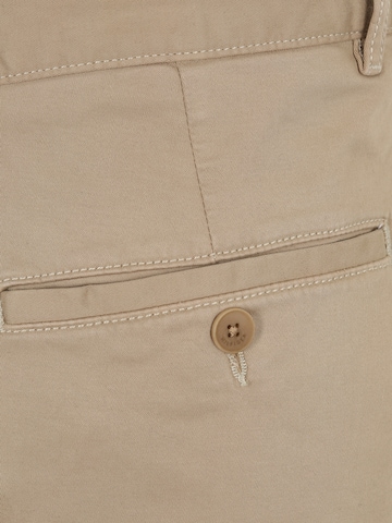 smėlio TOMMY HILFIGER Prigludęs „Chino“ stiliaus kelnės 'Bleecker'