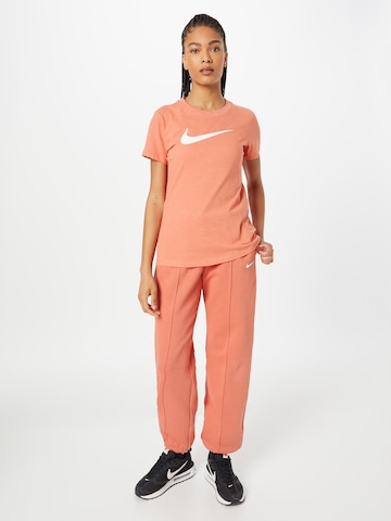 oranžs Nike Sportswear Vaļīgs piegriezums Bikses